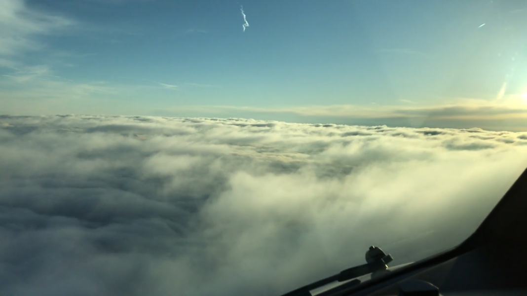 A beautiful view from a plane above the sky